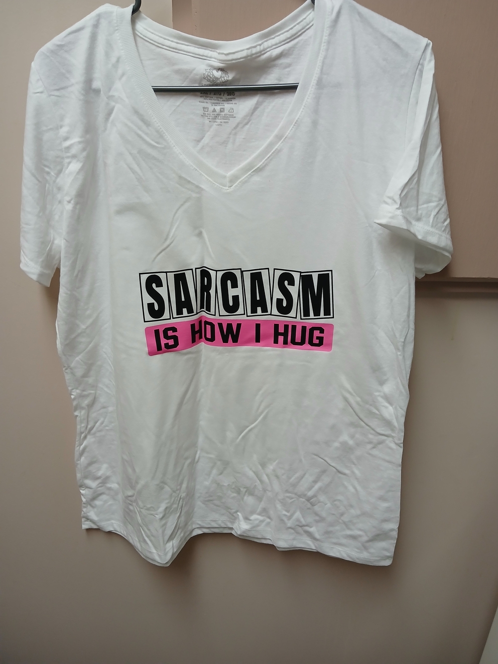 White V-Neck Tee with "SARCASM IS HOW I HUG" Graphic